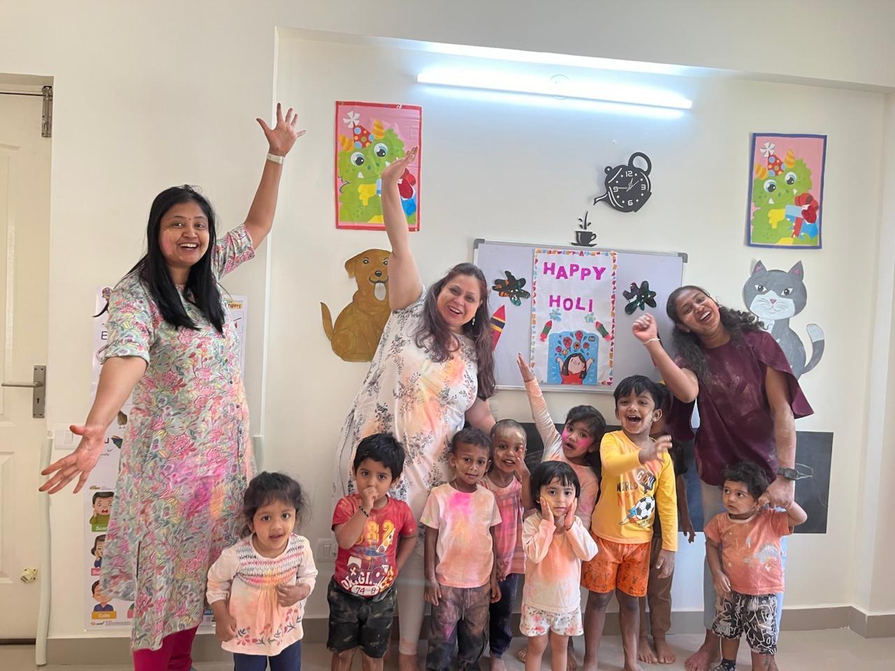 Caterpillar Care Preschool Brigade Golden Triangle with happy children and happy teachers